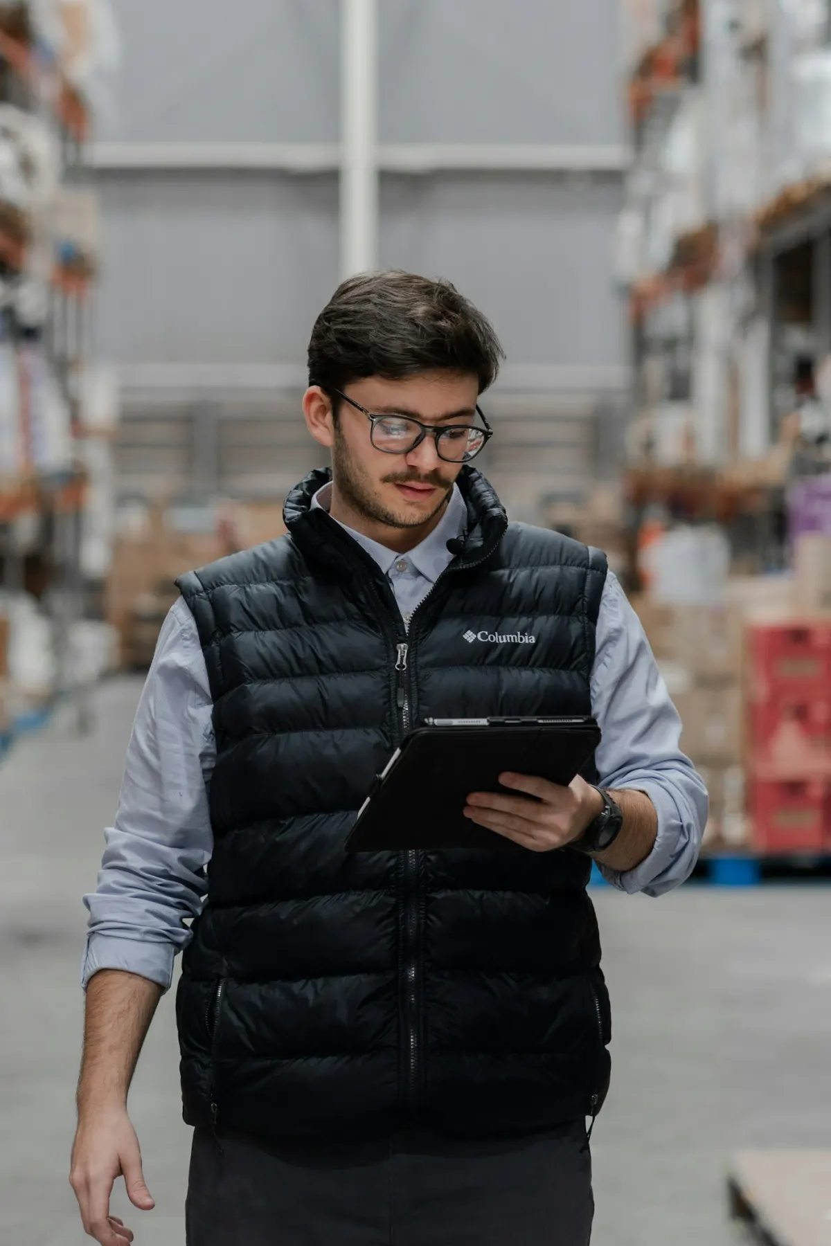 Sales representative using a tablet while working on site